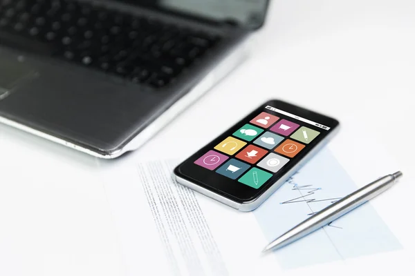 Close up of smartphone with menu icons on screen — Stock Photo, Image