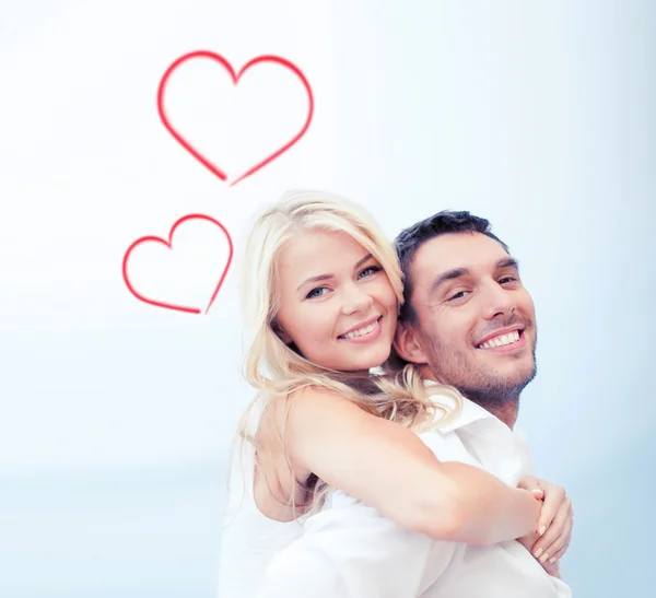 Couple having fun on the beach — Stock Photo, Image