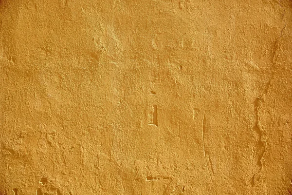 Yellow painted stone wall surface — Stock Photo, Image