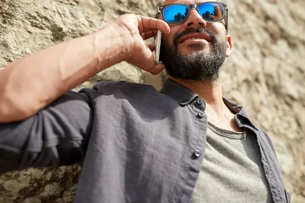 Close up of man calling on smartphone in city — Stock Photo, Image