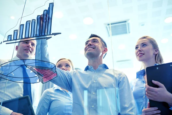 Smiling business people with marker and stickers — Stock Photo, Image