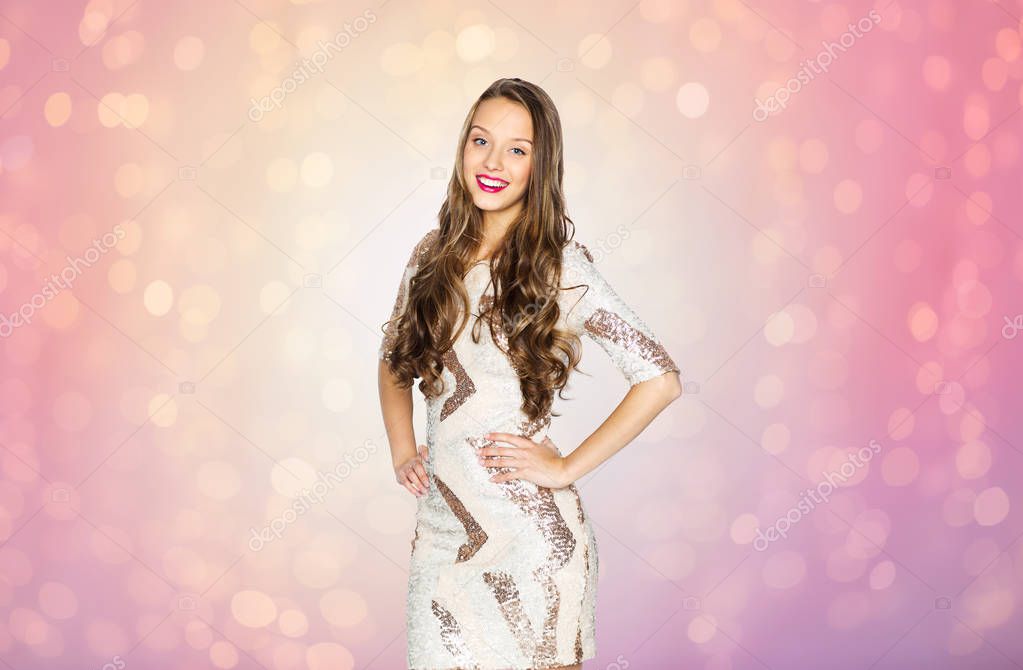 Happy young woman or teen girl in fancy dress Stock Photo by ©Syda_Productions 129050806 Happy young woman or teen girl in fancy dress Stock Photo by ©Syda_Productions 129050806