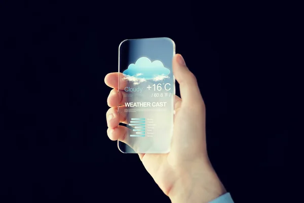 天気アプリでスマート フォンでの手のクローズ アップ — ストック写真