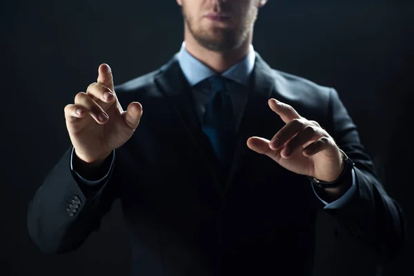 Close up of businessman touching virtual screen — Stock Photo, Image