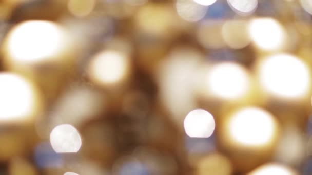 Luces de Navidad borrosas doradas bokeh — Vídeos de Stock