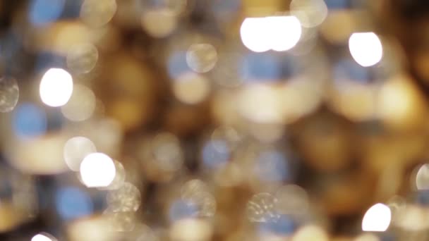 Luces de Navidad borrosas doradas bokeh — Vídeos de Stock