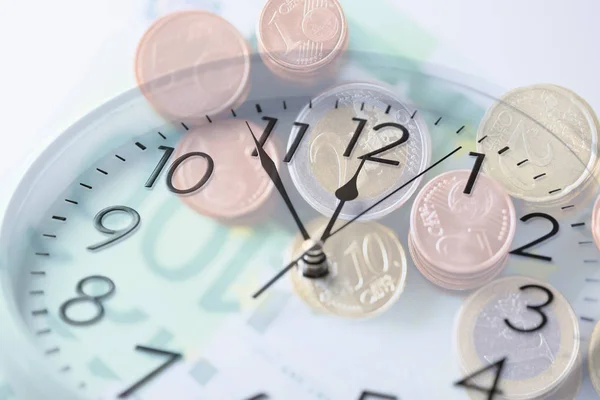 Clock over euro money with double exposure — Stock Photo, Image