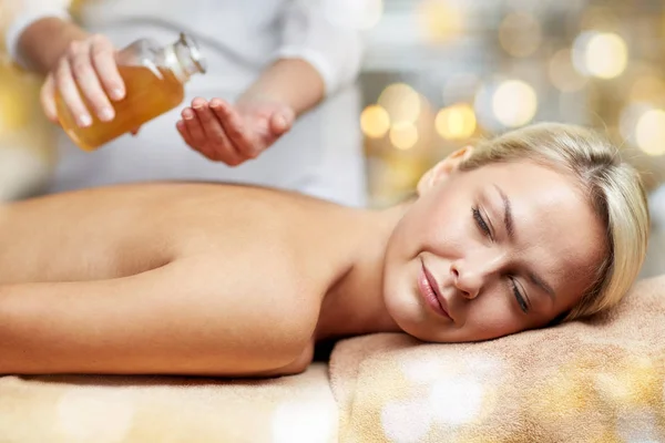 Close up of woman lying on massage table in spa — Stock Photo, Image