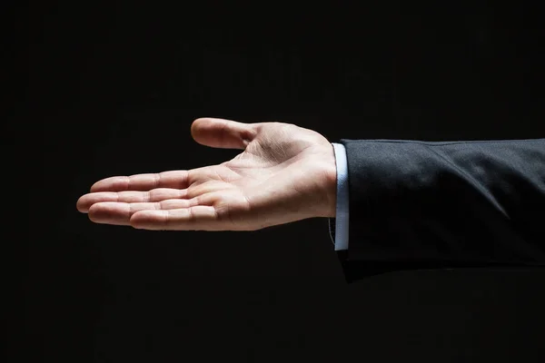 Close up of businessman with empty hand — Stock Photo, Image