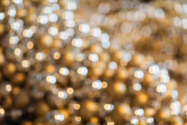Niewyraźne złote lampki świąteczne bokeh — Zdjęcie stockowe