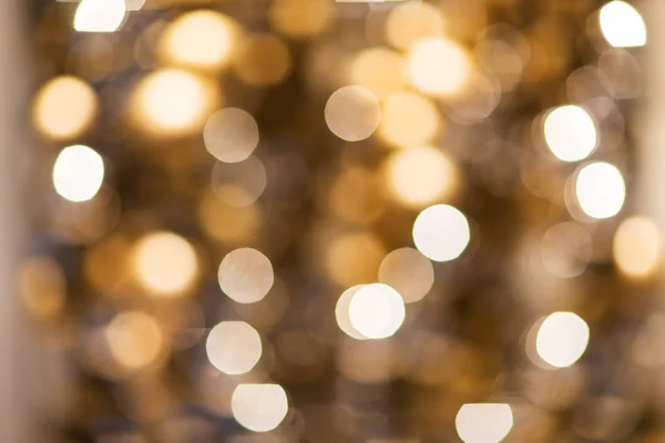 Luces de Navidad borrosas doradas bokeh — Foto de Stock