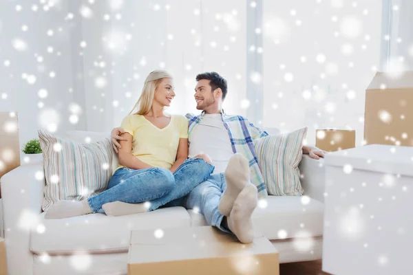 Happy couple with big cardboard boxes at new home — Stock Photo, Image