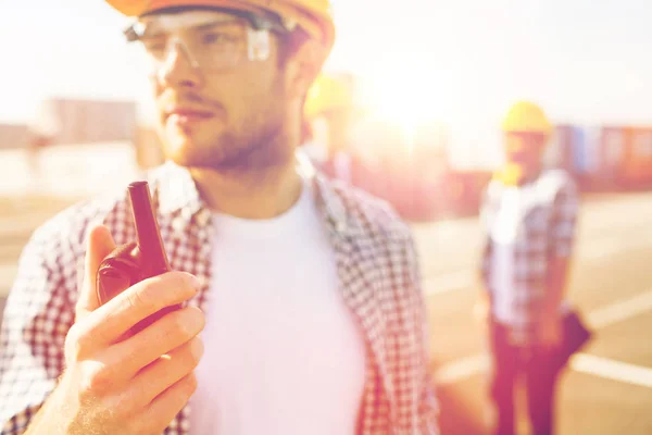 Close up of builder in hardhat with walkie talkie — Stock Photo, Image