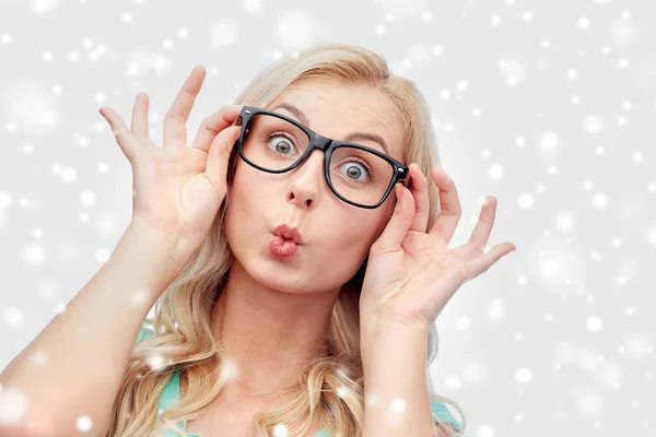 Happy young woman in glasses making fish face — Stock Photo, Image