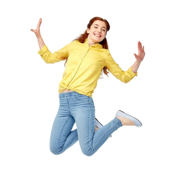 Usmívající se mladá žena skákání ve vzduchu — Stock fotografie