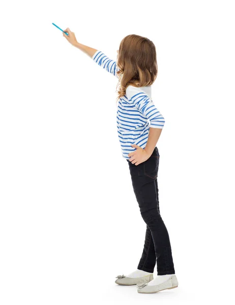 Girl pointing marker at something invisible — Stock Photo, Image