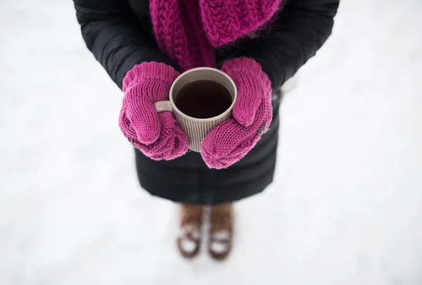 Close up of woman with tea mug outdoors in winter — Stock Photo, Image