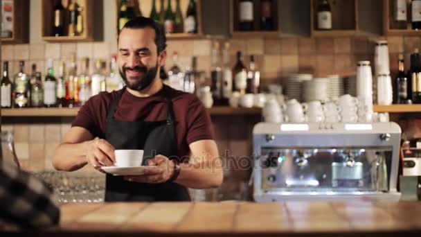 Man or waiter serving customer in coffee shop — Stock Video