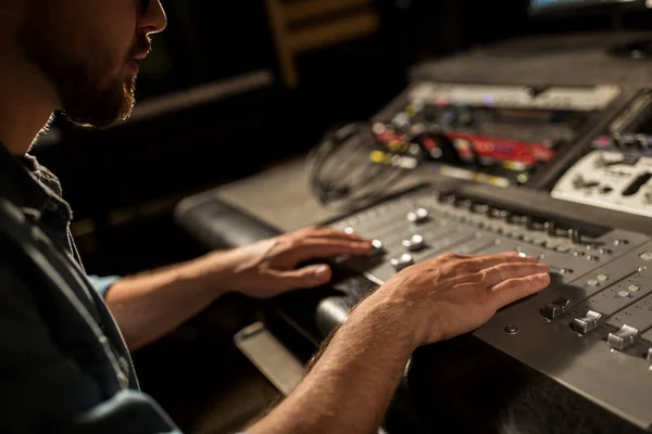 Man using mixing console in music recording studio — Stock Photo, Image