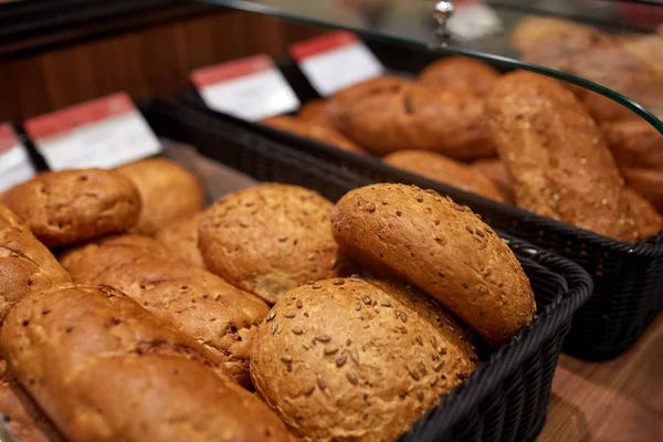 Close up of bread at bakery or grocery store — Stock Photo, Image