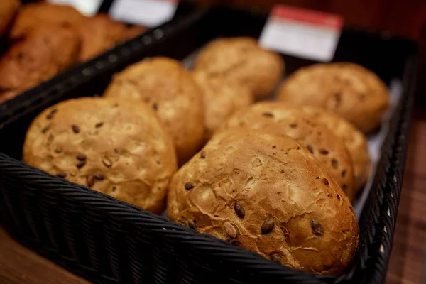 Close up of bread at bakery or grocery store — Stock Photo, Image