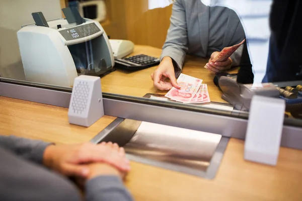Clerk counting cash money at bank office — Stock Photo, Image