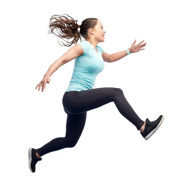 Feliz sonriente joven deportista saltando en el aire —  Fotos de Stock