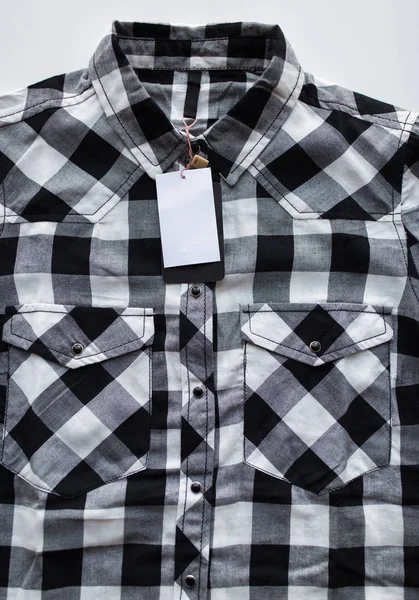 Close up of checkered shirt on white background — Stock Photo, Image