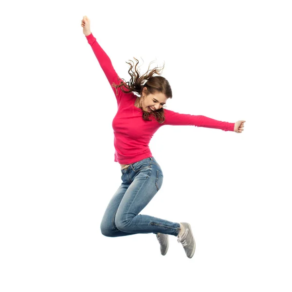 Usmívající se mladá žena skákání ve vzduchu — Stock fotografie