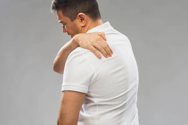 Close up of man suffering from backache — Stock Photo, Image