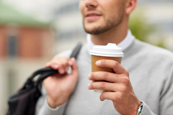 Close up of man with coffee cup on street — Stock Photo, Image