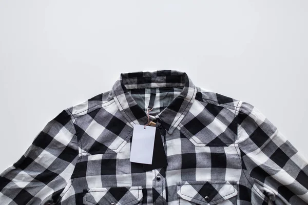 Close up de camisa xadrez no fundo branco — Fotografia de Stock