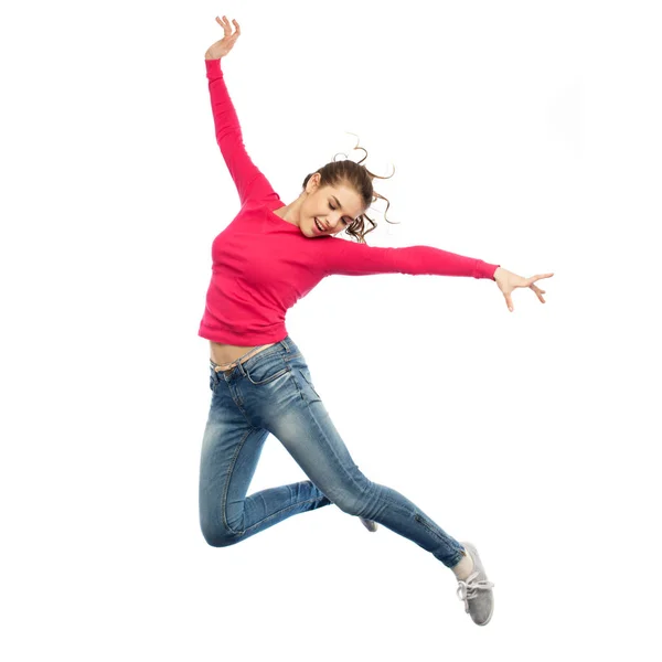 Feliz joven saltando en el aire o bailando — Foto de Stock