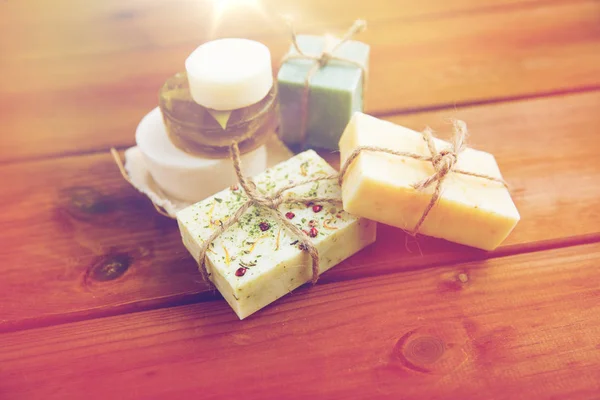 Close up of handmade soap bars on wood — Stock Photo, Image