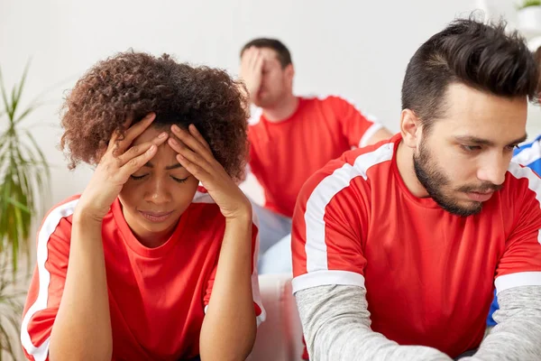 Sad friends or football fans at home — Stock Photo, Image