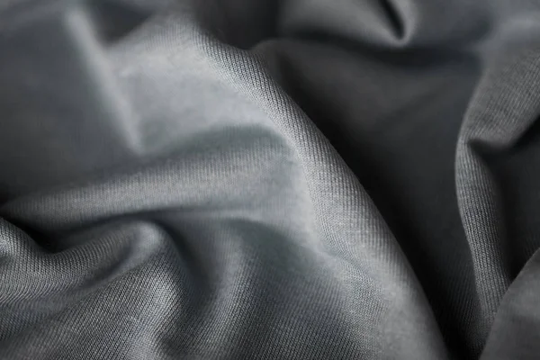 Close-up de fundo tecido cinzento ou tecido — Fotografia de Stock