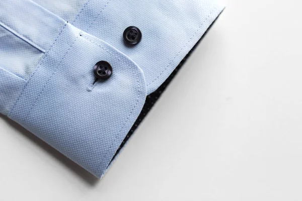 Close up of blue shirt sleeve — Stock Photo, Image