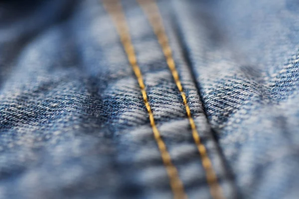 Primer plano de la costura en la ropa de mezclilla o jeans —  Fotos de Stock