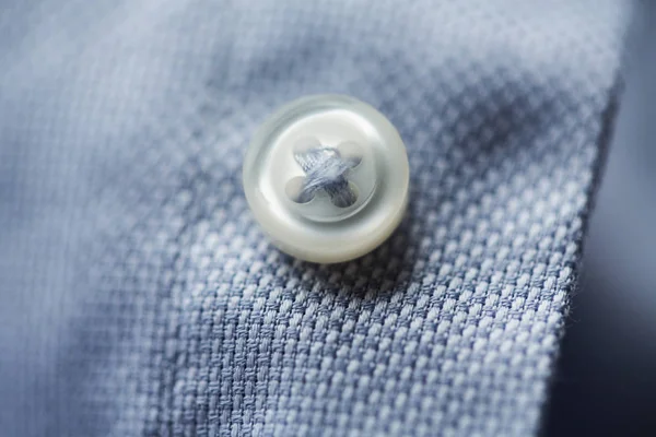 Close up of blue shirt button — Stock Photo, Image