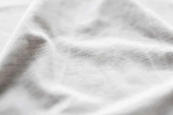 Közelkép a pamut textil vagy szövet háttér — Stock Fotó