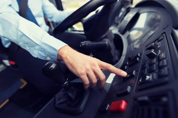 Close up of driver driving passenger bus — Stock Photo, Image