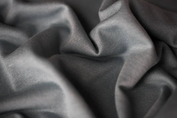 Közelkép a szürke textil vagy szövet háttér — Stock Fotó