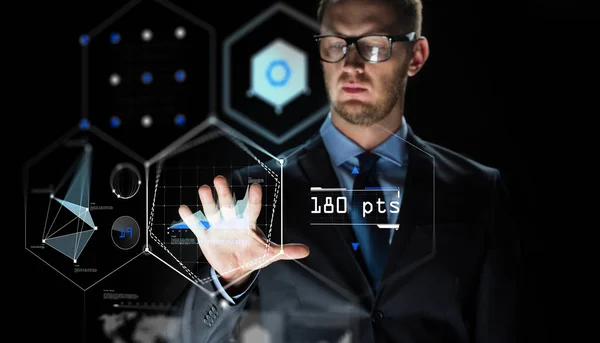 Businessman touching virtual screen projection — Stock Photo, Image