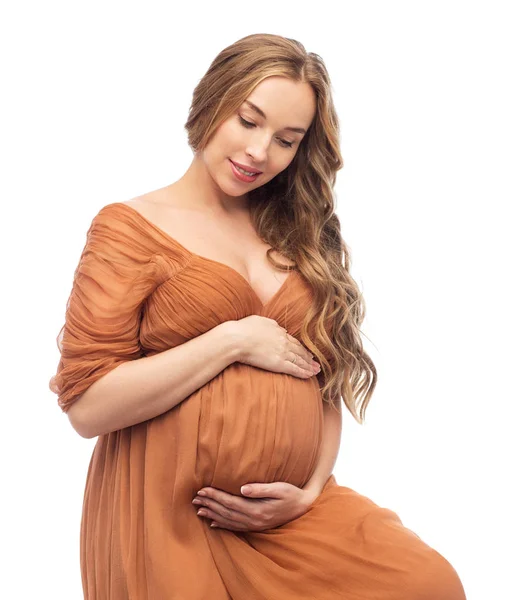 Glad gravid kvinna röra hennes stora mage — Stockfoto