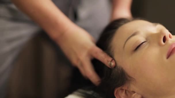 Woman having head massage at spa — Stock Video