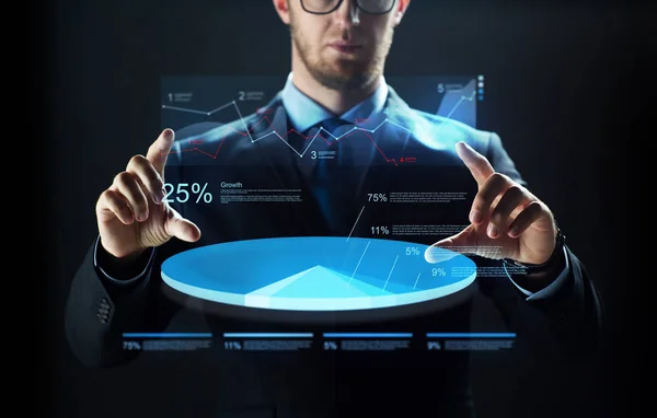 Close up of businessman with virtual charts — Stock Photo, Image