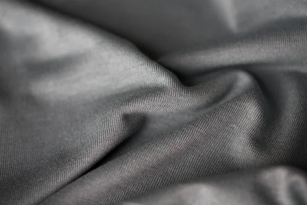Close-up de fundo tecido cinzento ou tecido — Fotografia de Stock