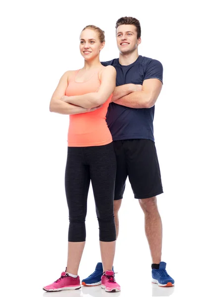 Happy sportive man and woman — Stock Photo, Image