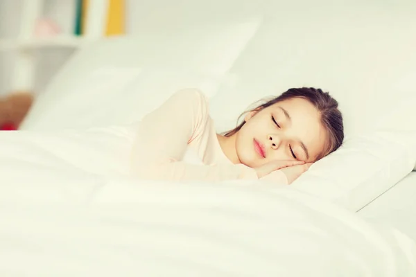 Girl sleeping in bed at home — Stock Photo, Image