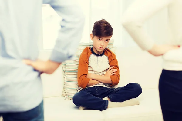 Upset or feeling guilty boy and parents at home — Stock Photo, Image